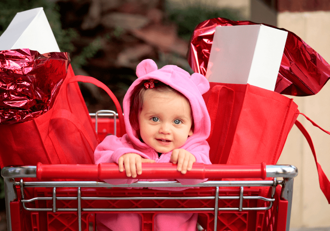 Baby in shopping trolley