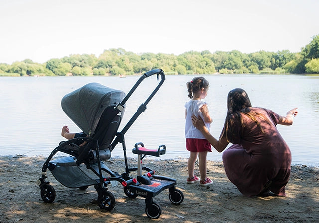 Family with buggyboard on pram