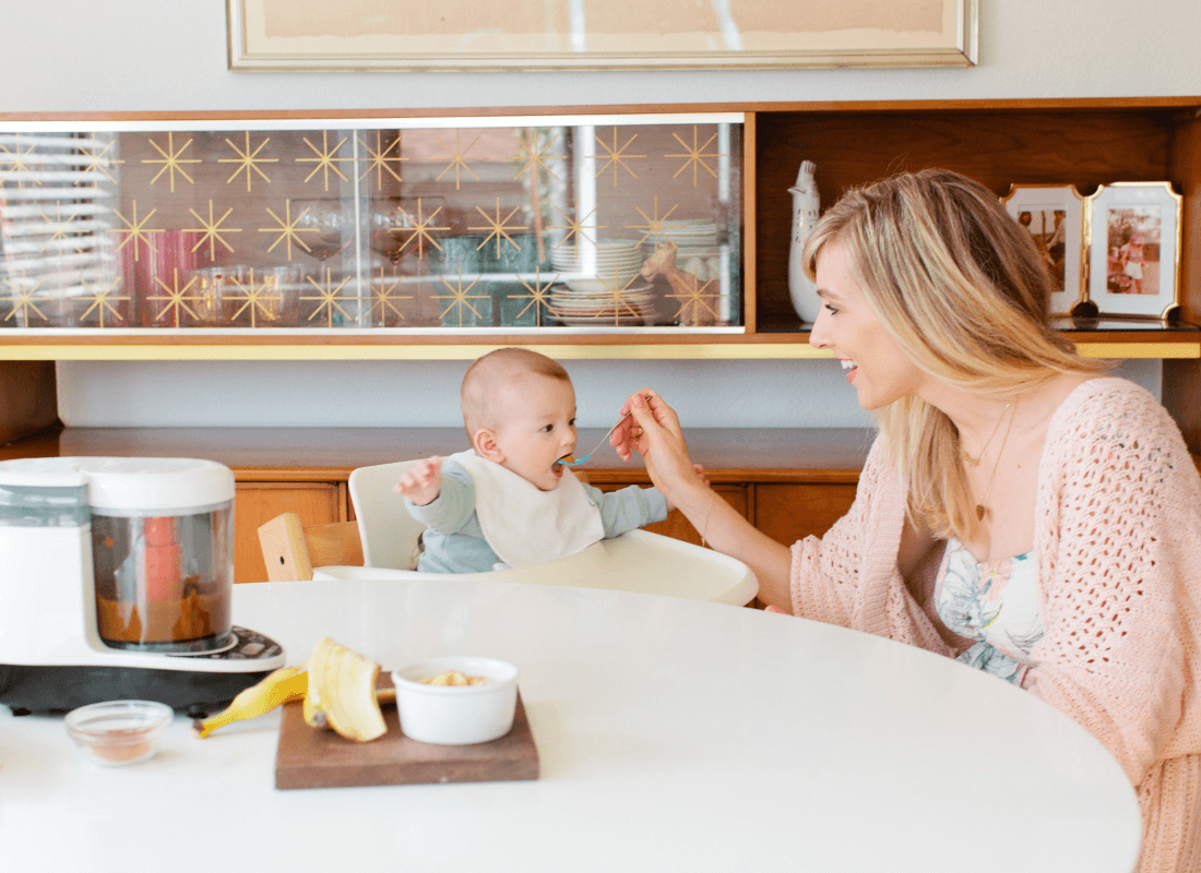 Mum feeding baby