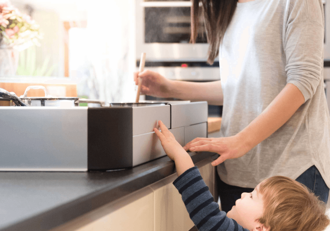 Child with fred stove and hob protector 