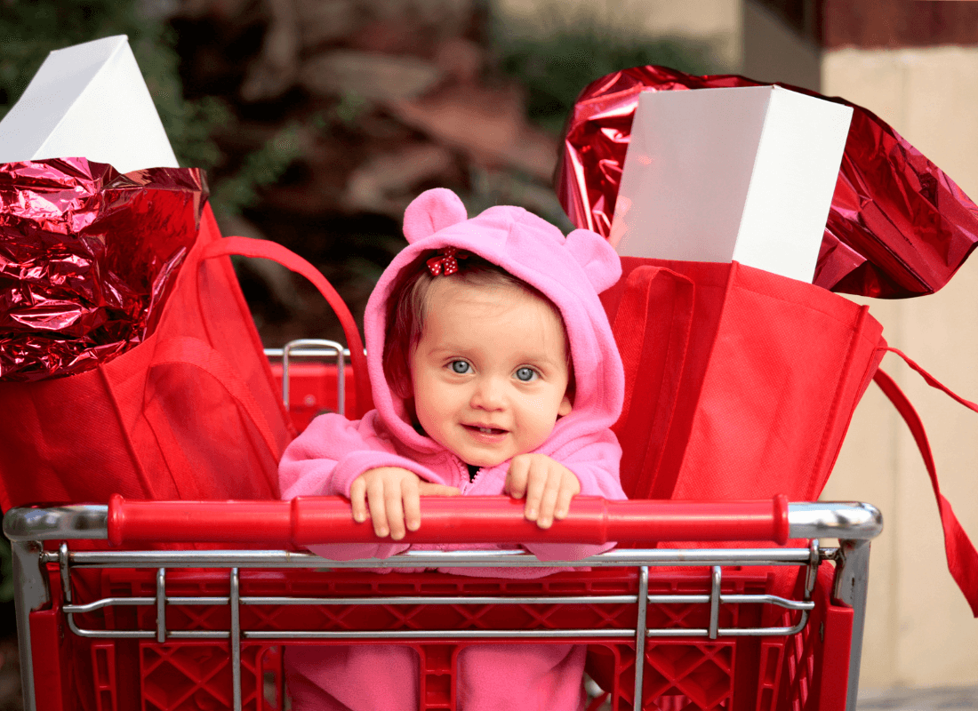 Baby in shopping trolley