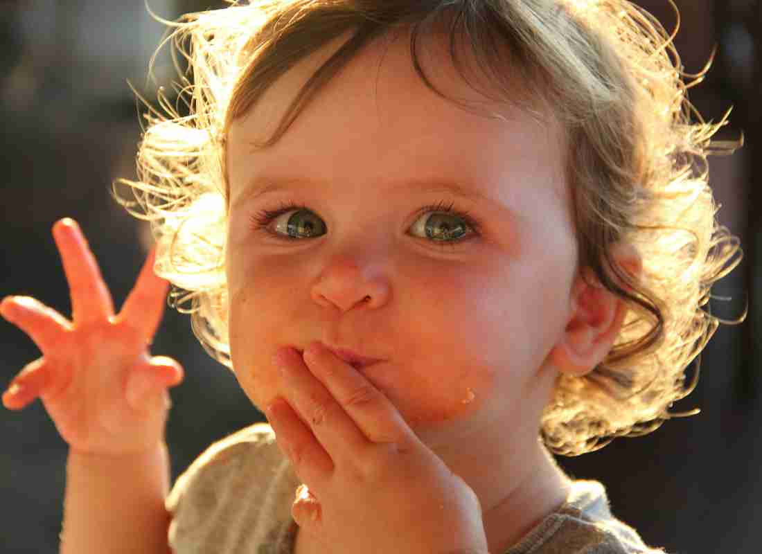 Child being fed a pureee