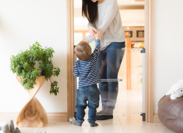 Baby and mum with a stairgate