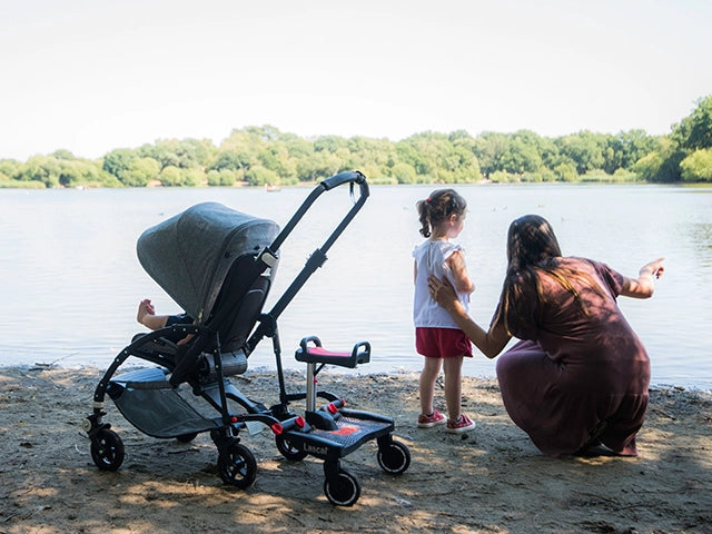 Family with buggyboard on pram
