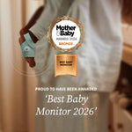 A baby wearing the Owlet Medically-Certified Dream Sock® - Mint stands beside an adult. Text overlay highlights a Bronze 2026 Mother & Baby Award for Best Baby Monitor, awarded to Owlet.