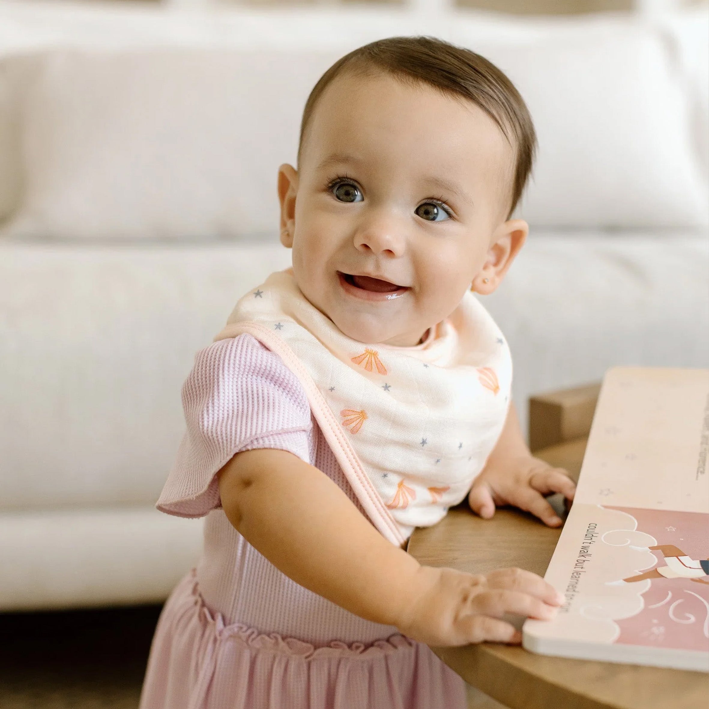 Baby in a pink dress and Mermaids Bandana Bib