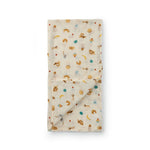 Folded French Breakfast Muslin Swaddle on a white background