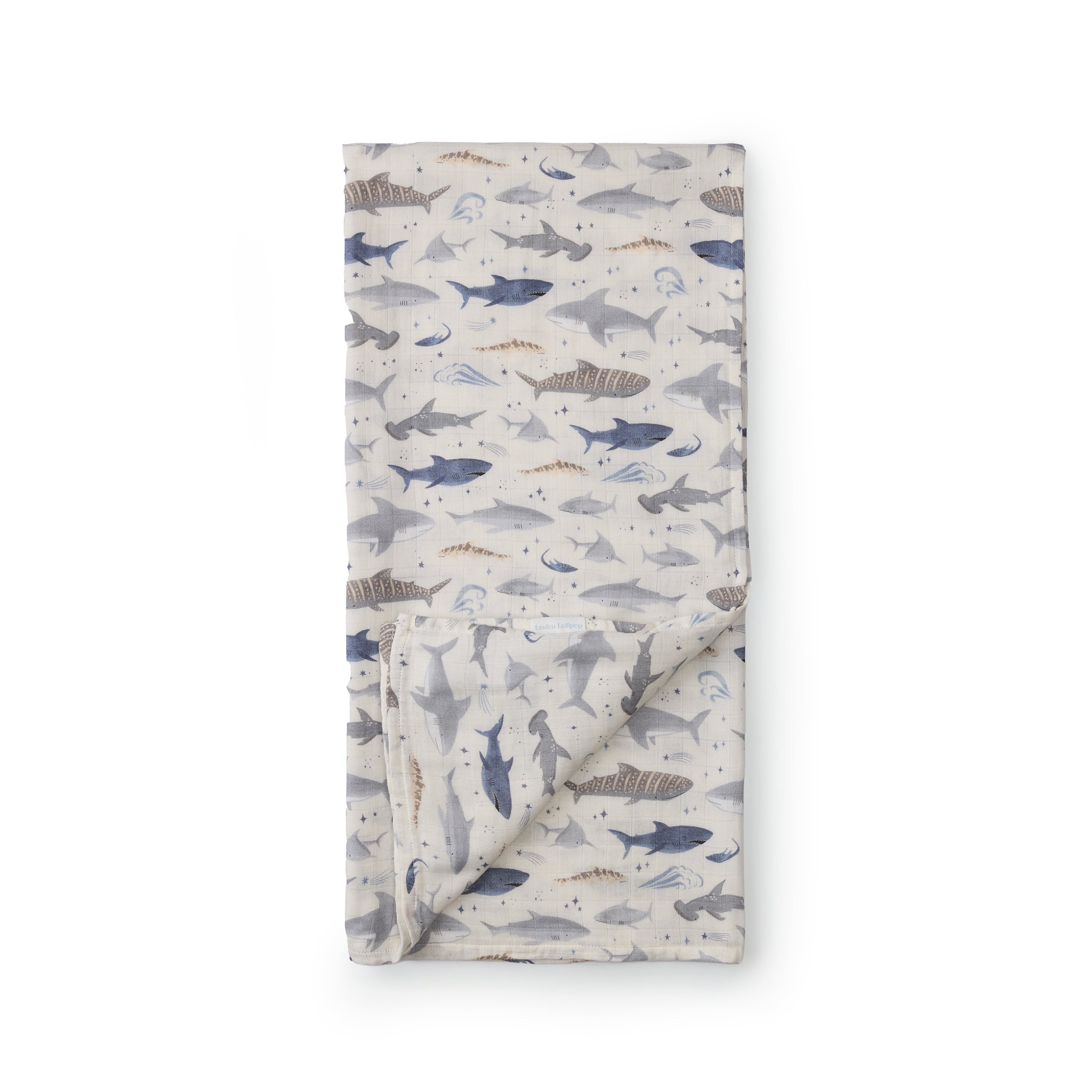 Folded Smiley Sharks Muslin Swaddle on a white background