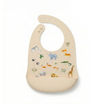 The Safari Jungle, silicone baby bib with a  safari animal print, including an elephant, giraffe, zebra, and lion.