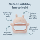 Baby teether with text highlighting its features on a light blue background. Lightweight and easy to hold. Textured surface massages sore gums. Freezer and dishwasher safe. Textured on both sides.