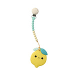 A picture of The Lemon teething clip with a creme and turquoise beaded strap