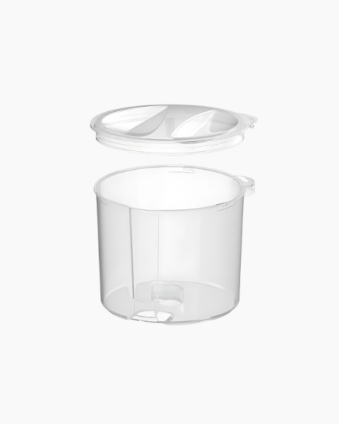 A clear, round Baby Brezza Formula Pro Mini Replacement Powder Container & Lid BUNDLE is shown with its matching transparent lid above it, both set against a plain white background.