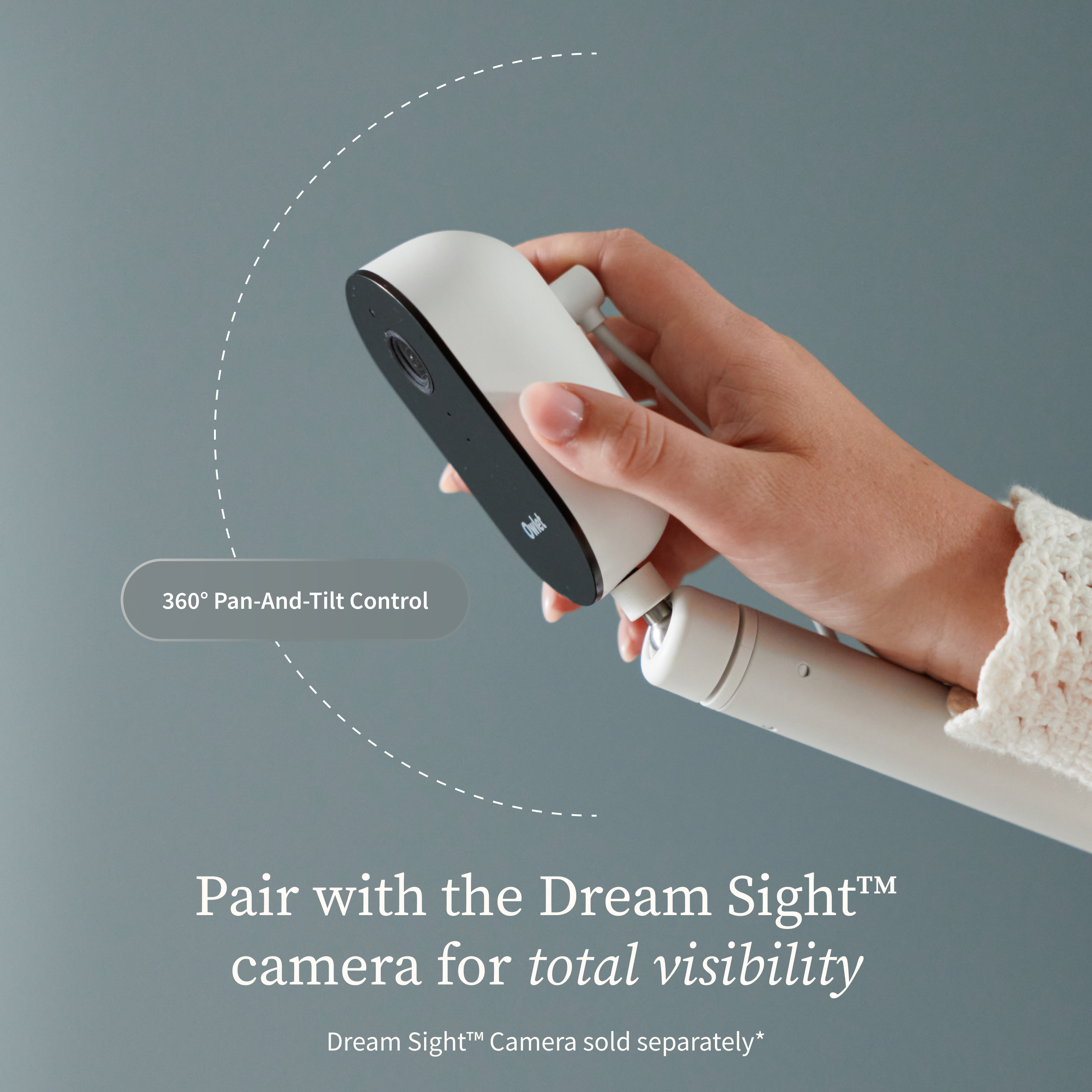 A hand holds a baby monitor camera on an Owlet Dream Sight™ Camera Stand, with a dashed arc indicating 360-degree pan-and-tilt motion and text stating: Pair with the Dream Sight camera for total visibility.